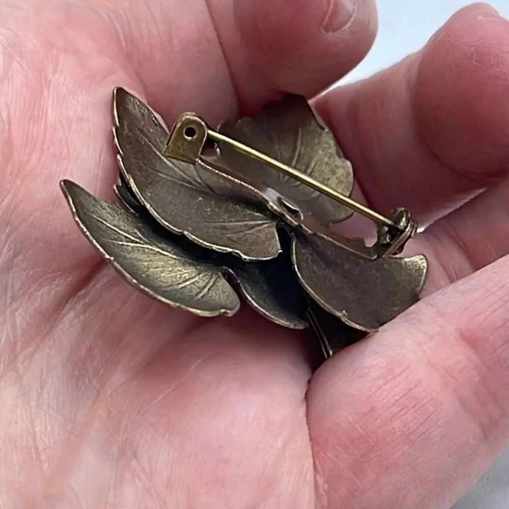 Vintage enameled layered leaf brooch.